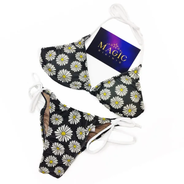 Black bikini with white daisy flower print and white adjustable ties by Magic Bikinis.