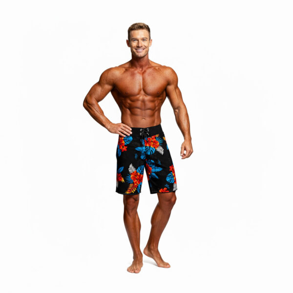 Kai Island Style IFBB Elite Pro Men’s Physique Boardshorts – black floral print, front view