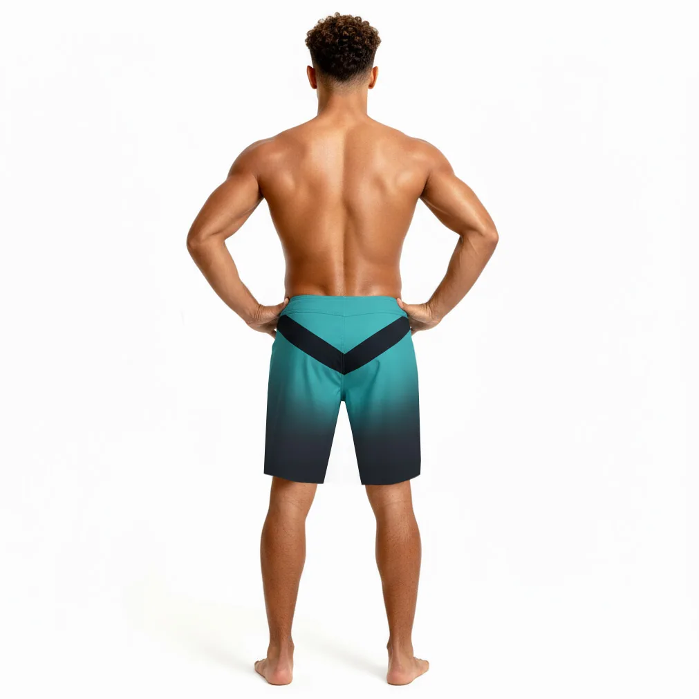 Titan IFBB Elite Pro Boardshorts – back view with turquoise to black fade and stripe