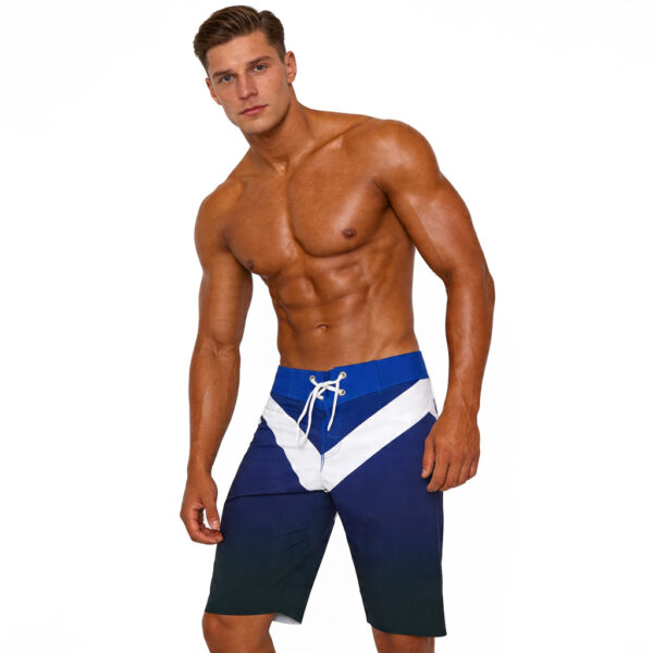 Men’s bodybuilding board shorts in cobalt blue, navy and white with a bold chevron design